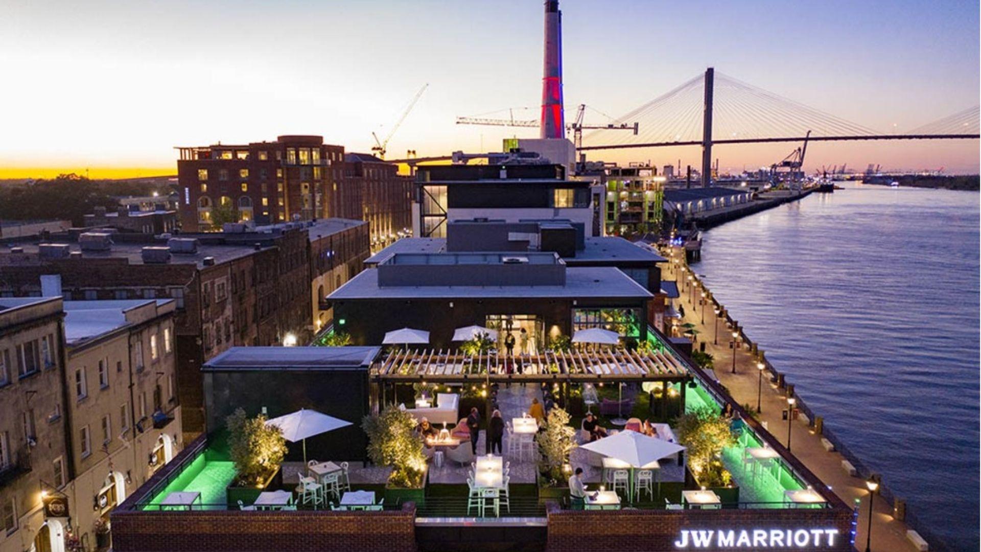 IMAGE OF AERIAL VIEW OF ROOFTOP RIVER VIEWS