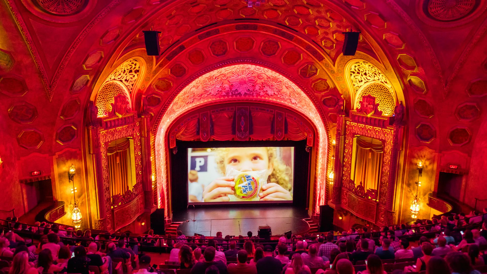 people enjoying a show at Alabama Theatre.