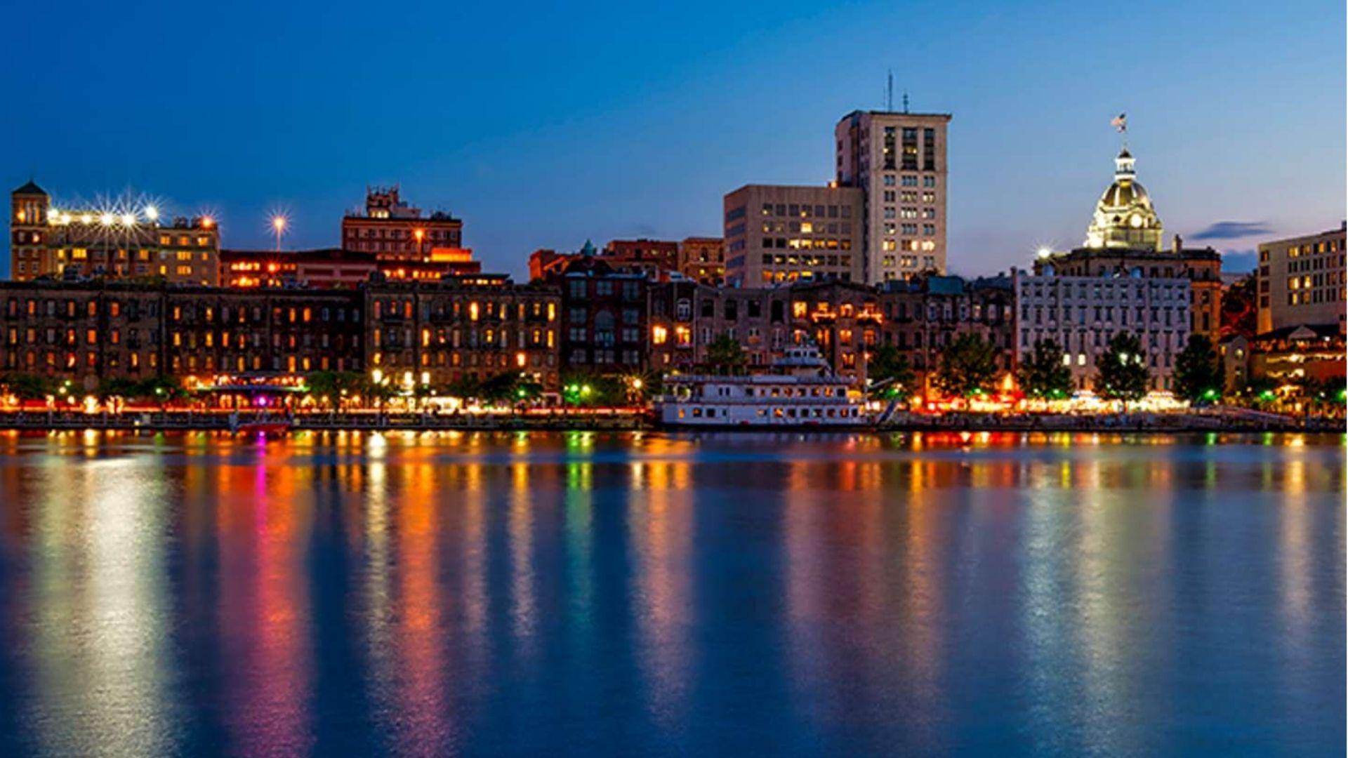 IMAGE OF A NIGHT STILL WITH WATERFRONT