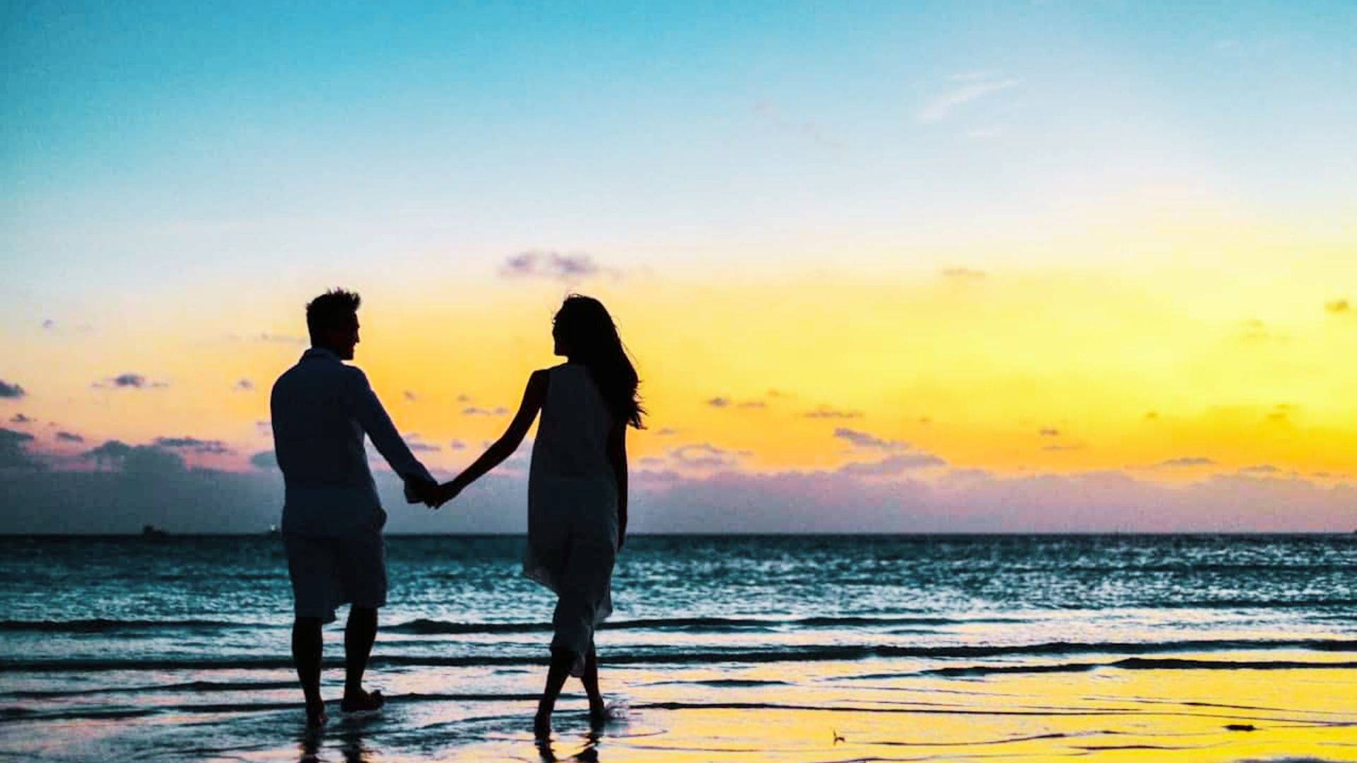 couples enjoying at the beach.