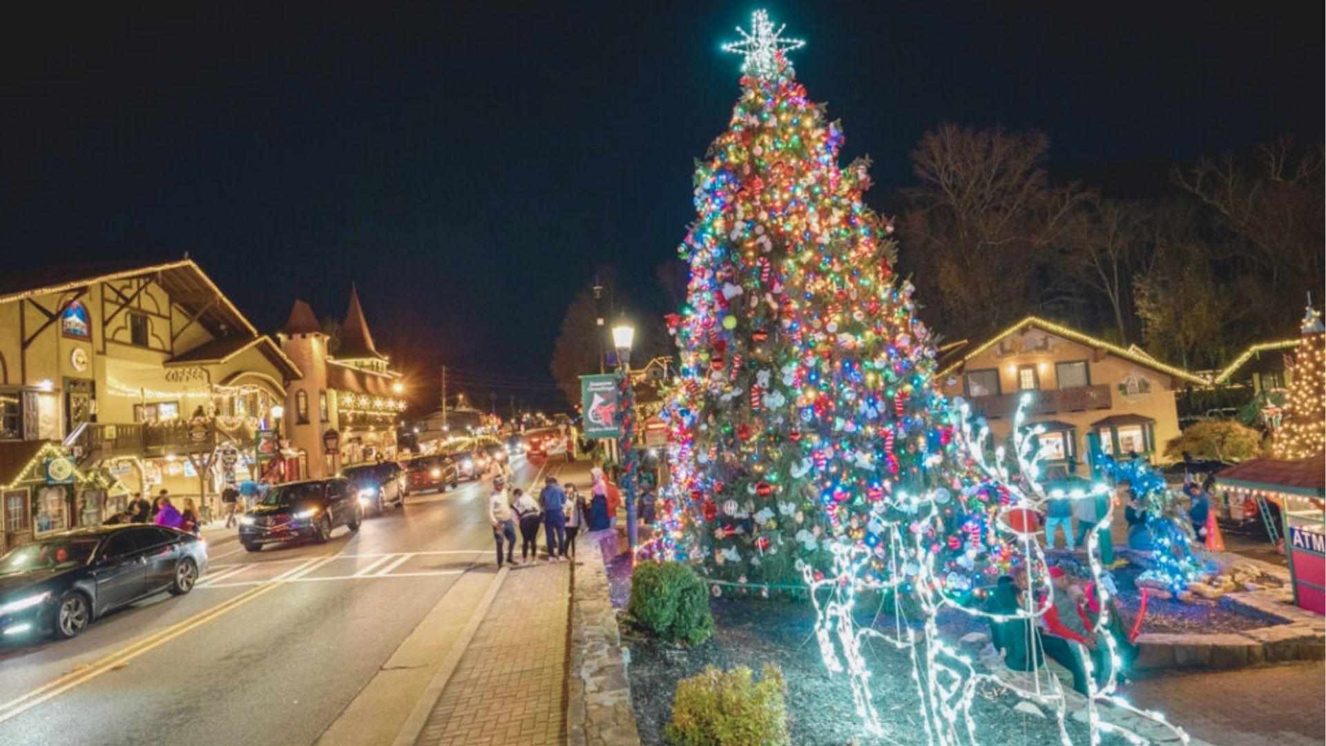 Helen’s town square at night with a towering Christmas tree covered in colorful ornaments and lights.