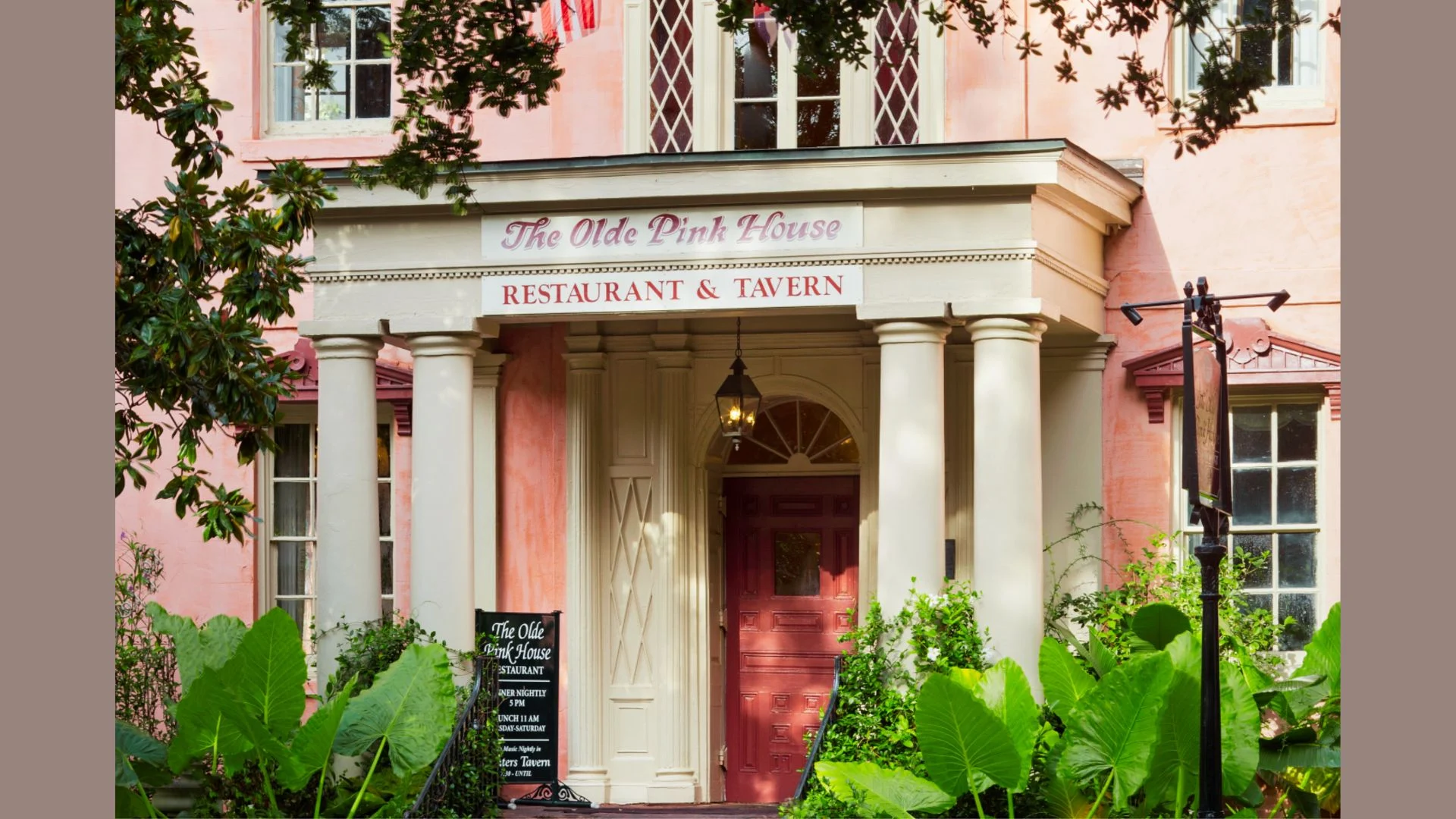 Historic courtyard restaurant with outdoor dog-friendly seating.