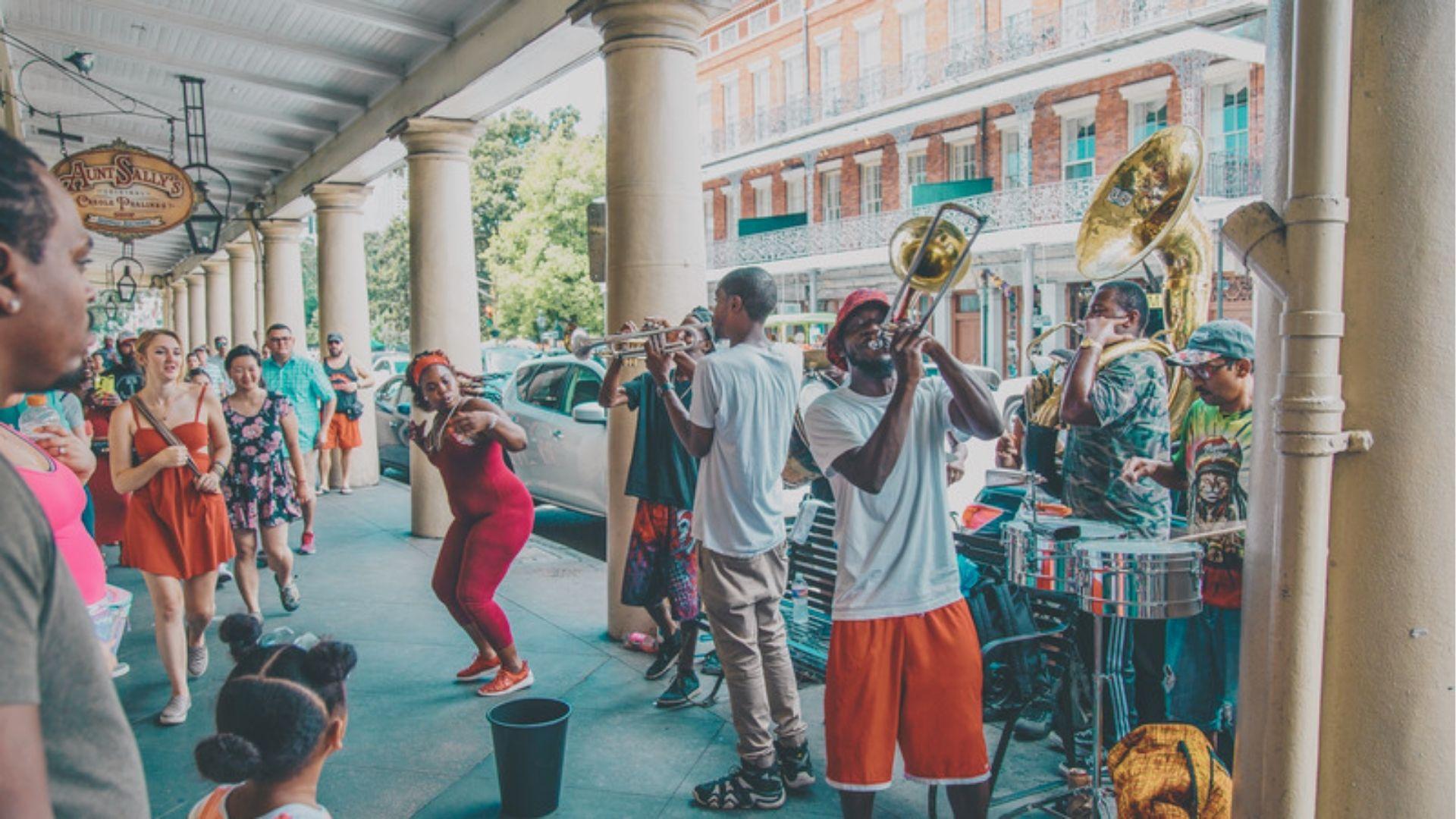 Catch a lively brass band performance under the French Quarter colonnade outside Aunt Sally’s.