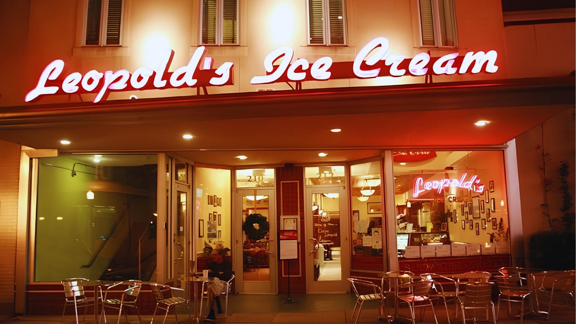 Leopold's Ice Cream shop glowing neon sign at night in Savannah Historic District.