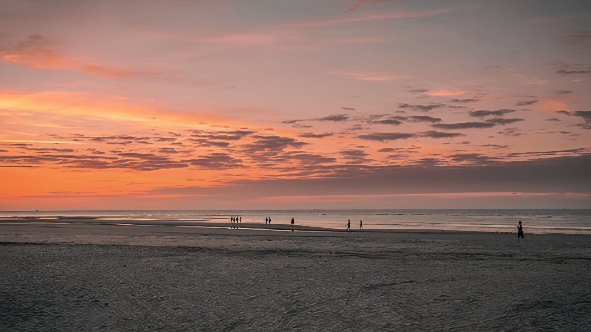 East Beach St. Simons shoreline at sunset with sandy beach, ocean waves, and coastal scenery.