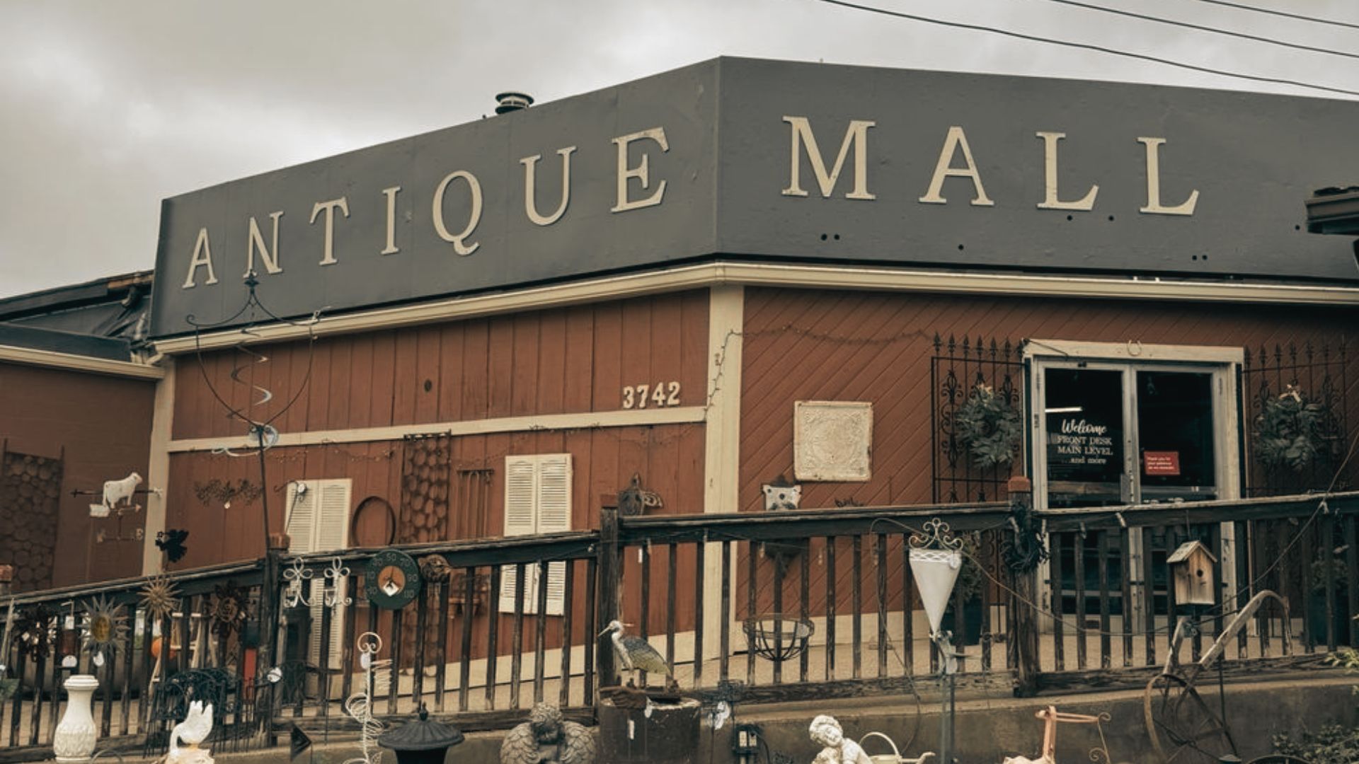 Exterior of a rustic antique mall, displaying vintage decor, in Augusta.