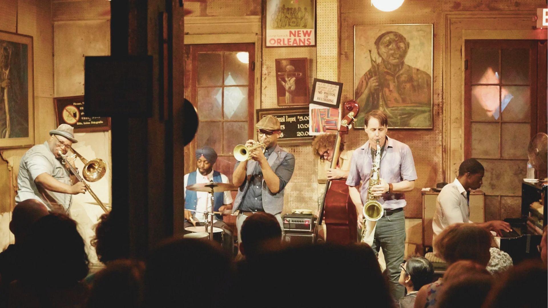 Experience live traditional jazz at Preservation Hall, a legendary French Quarter music venue.