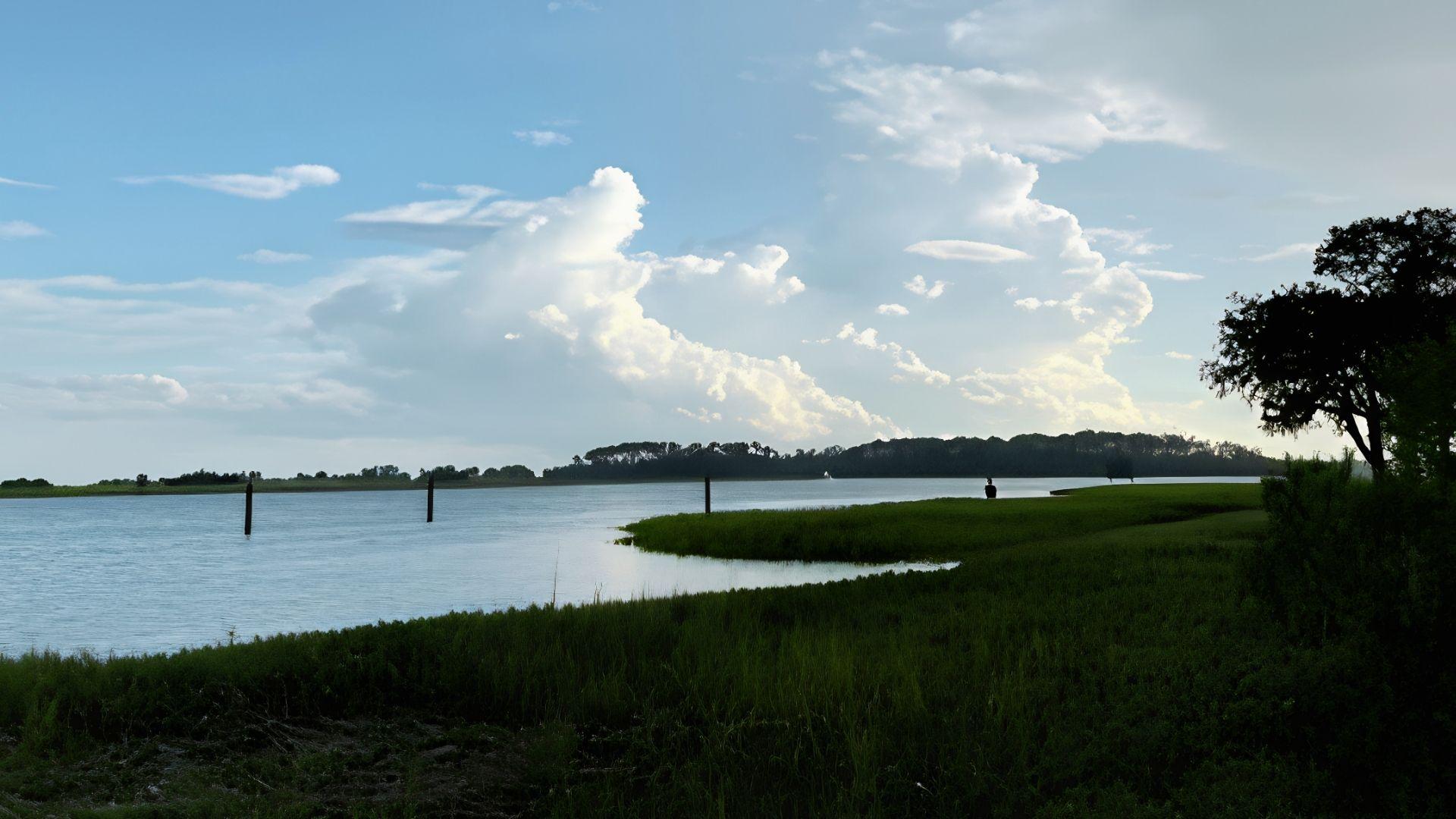 Grassy marsh and calm water at Butterbean Beach Savannah GA