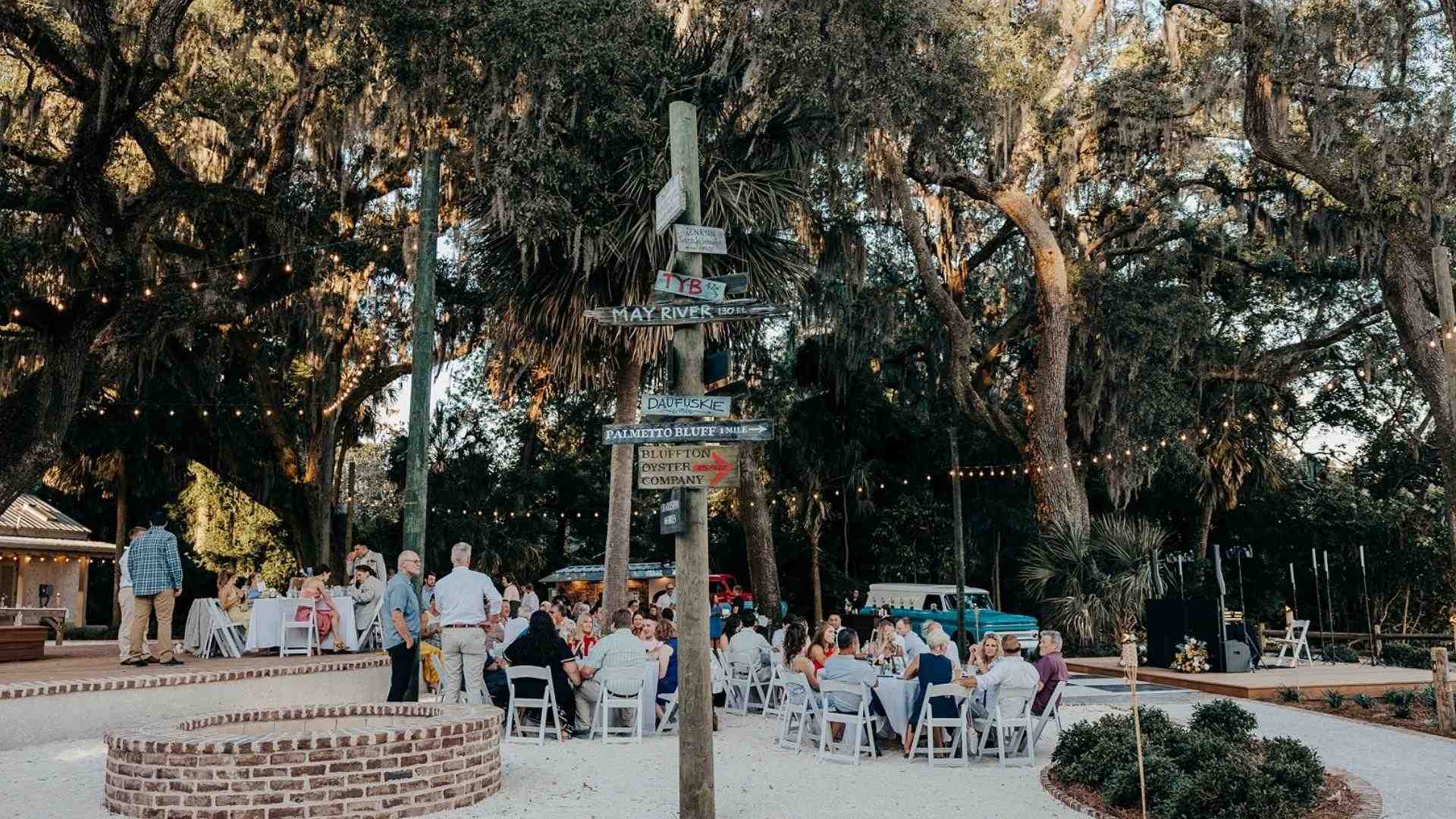 Savannah outdoor wedding reception with May River and Daufuskie signs