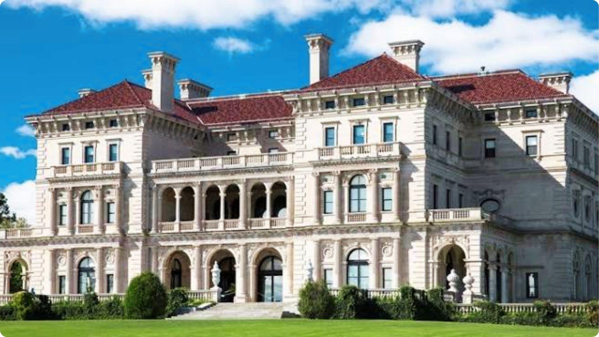 Grand Gilded Age mansion with red tile roof and arched balconies on Savannah walking tour map.