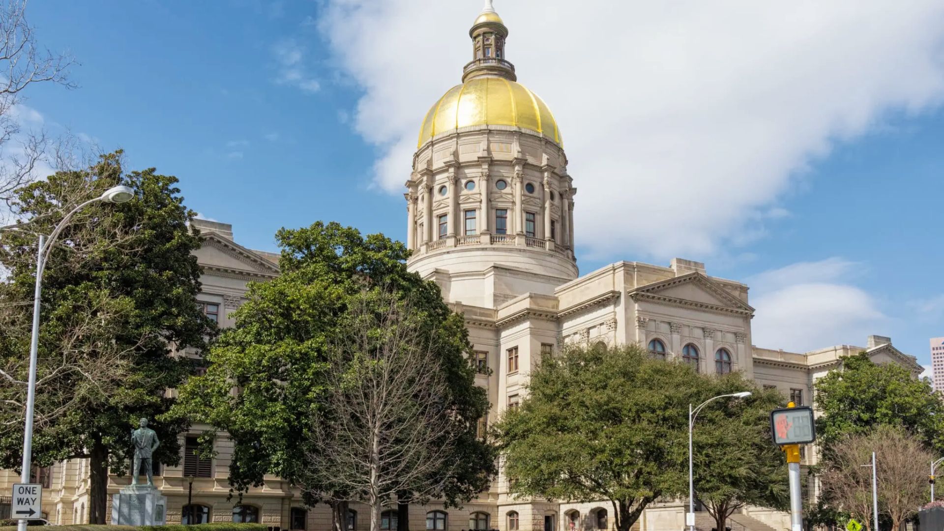 Georgia State Capitol with gold dome where landlord-tenant housing laws are enacted