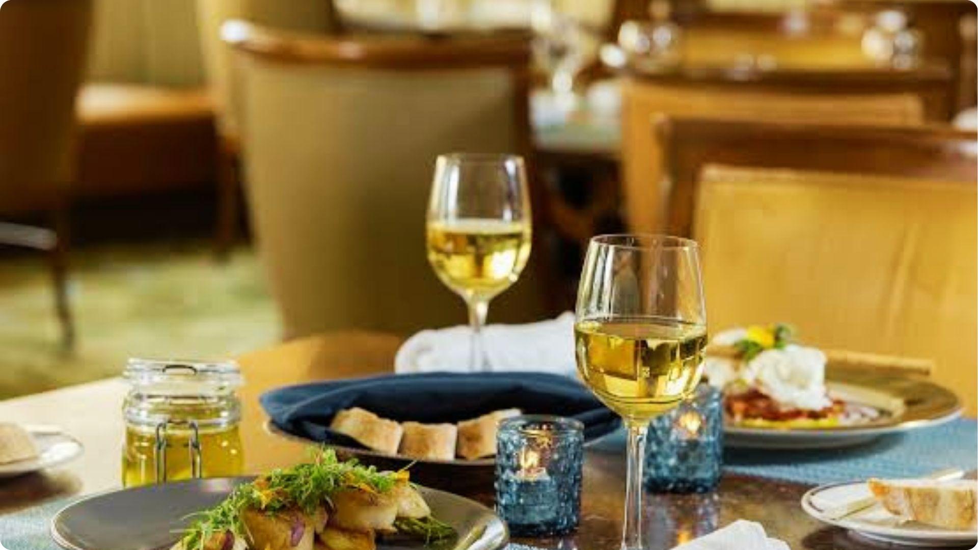 Romantic dinner for two with white wine and gourmet dishes at upscale Myrtle Beach restaurant