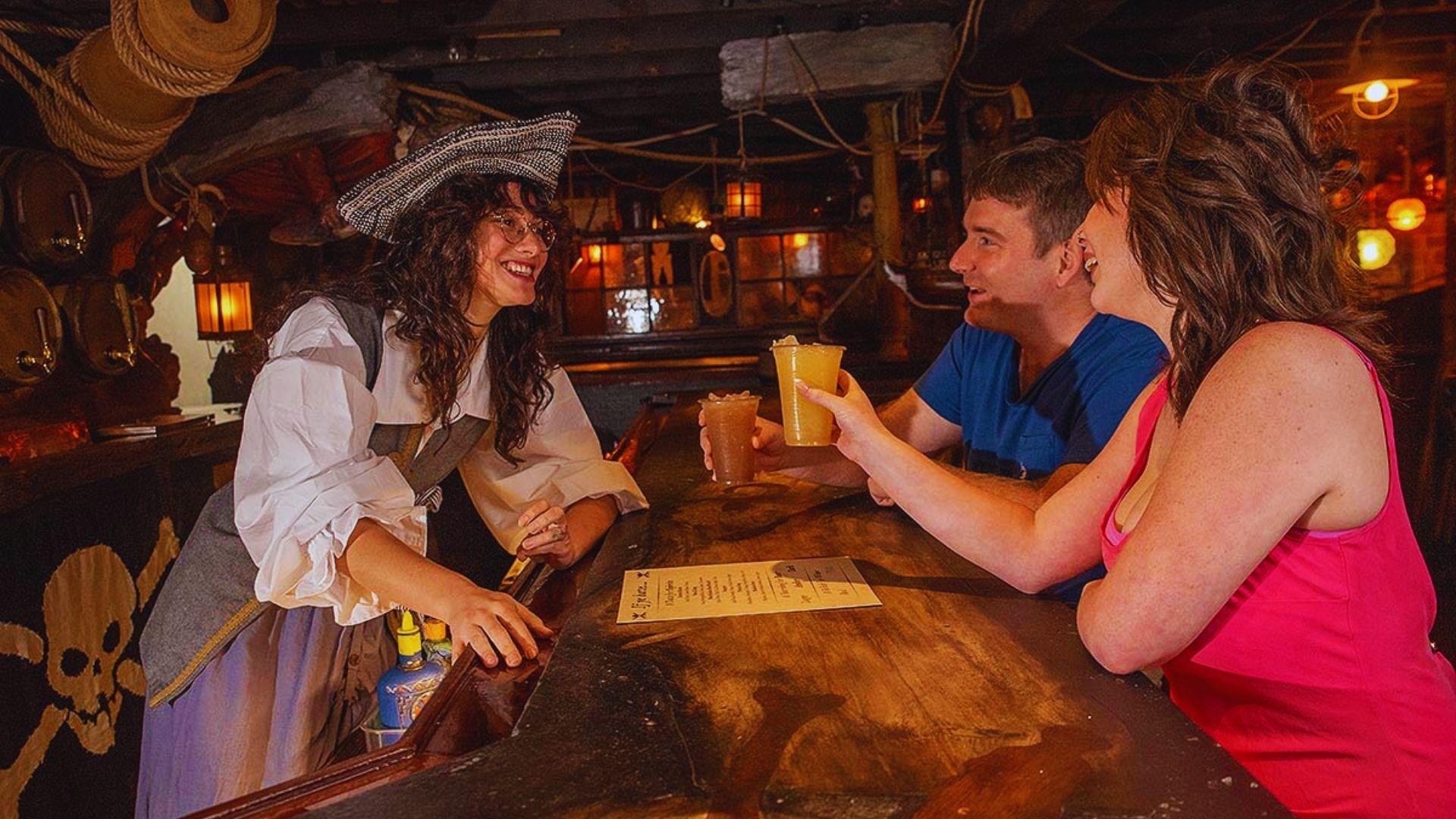 people enjoying drinks inside the Pirate Museum Savannah.