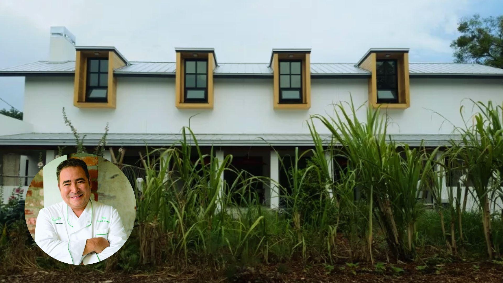 Modern white house with four wood-trimmed dormer windows above lush tall grass garden.