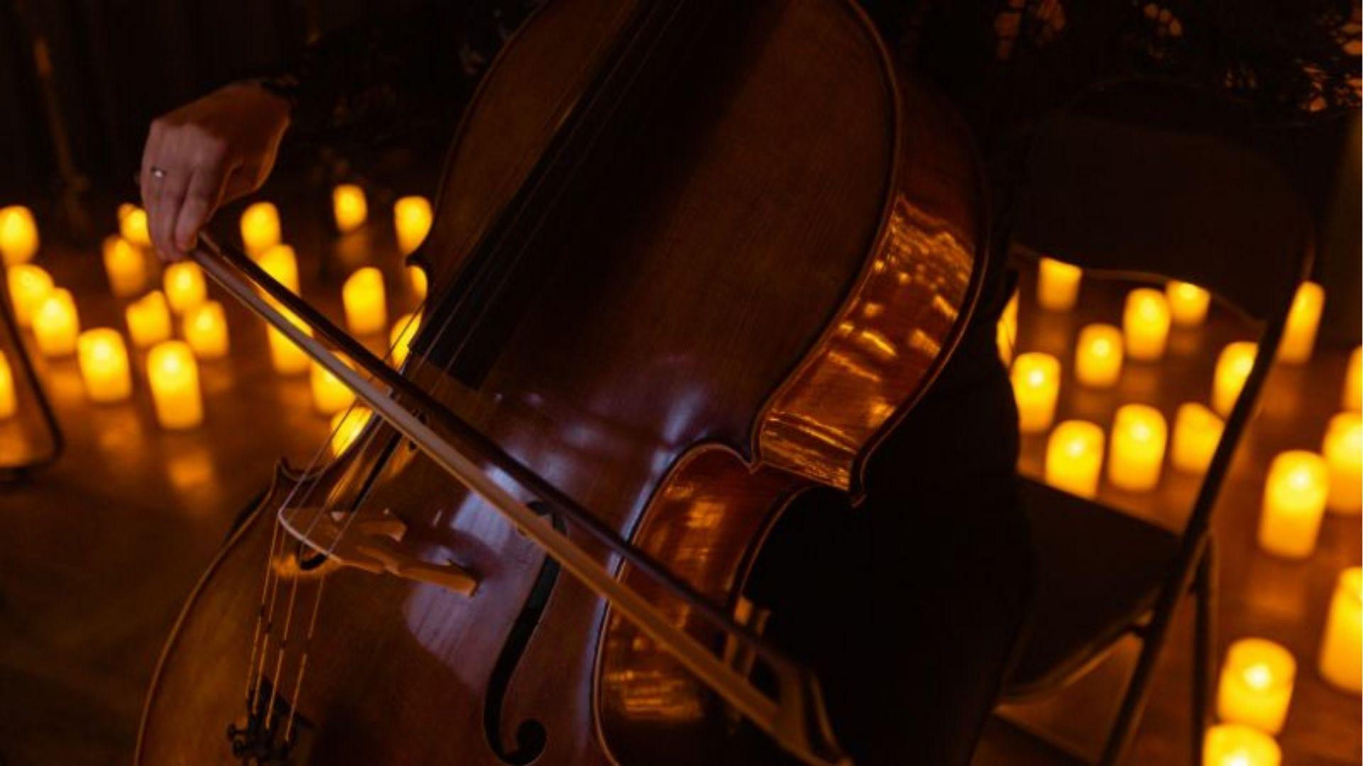 Cello player performing at romantic candlelightValentine's Dayconcert in Savannah