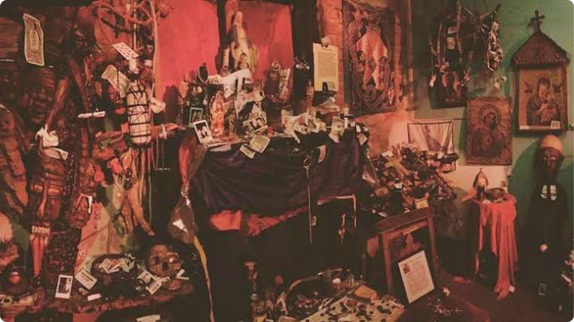 Mystical voodoo altar with dolls and offerings at Historic Voodoo Museum, unique French Quarter culture tour