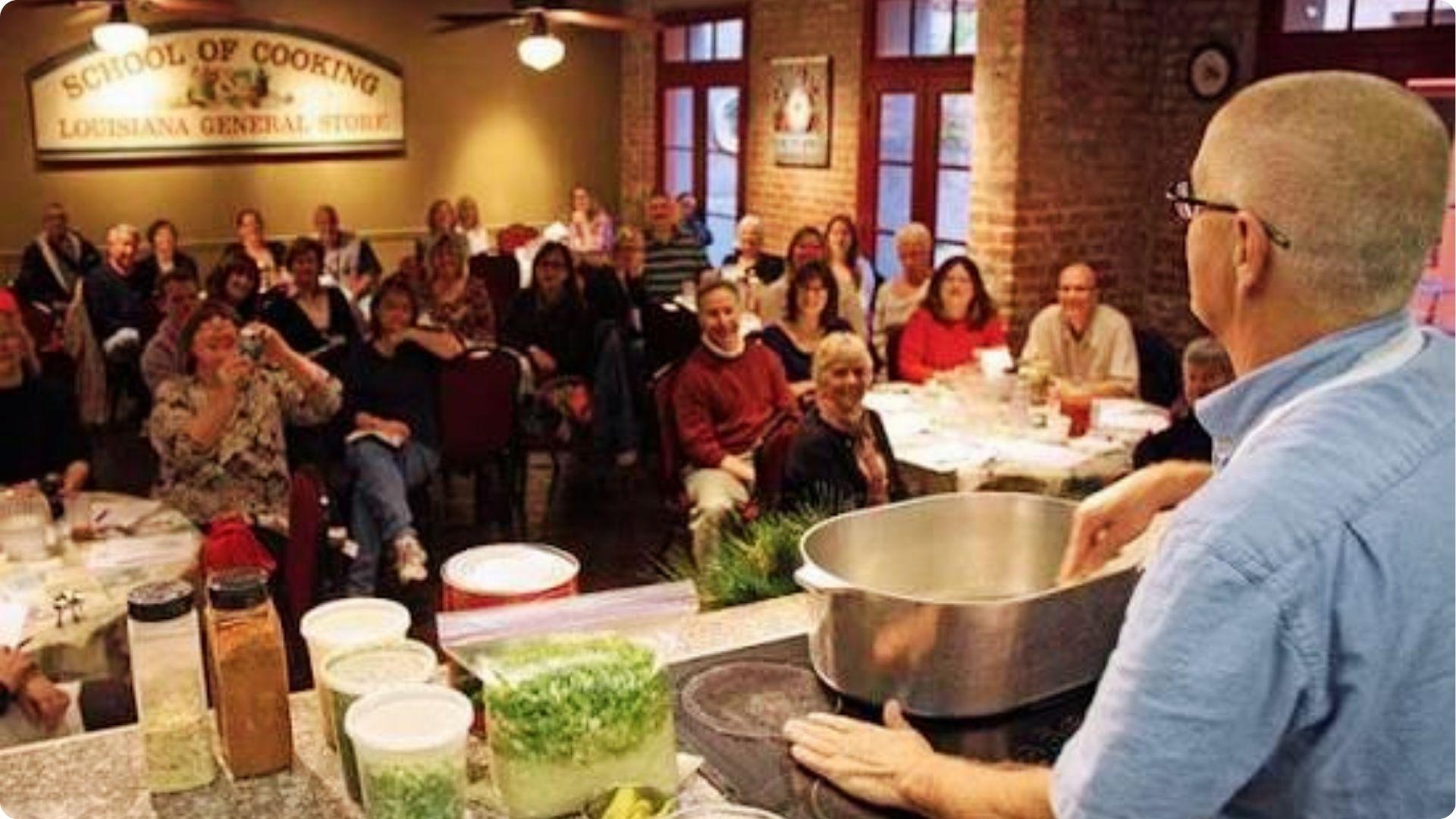 Chef teaching Creole cooking class at School of Cooking, hands-on food experience in French Quarter
