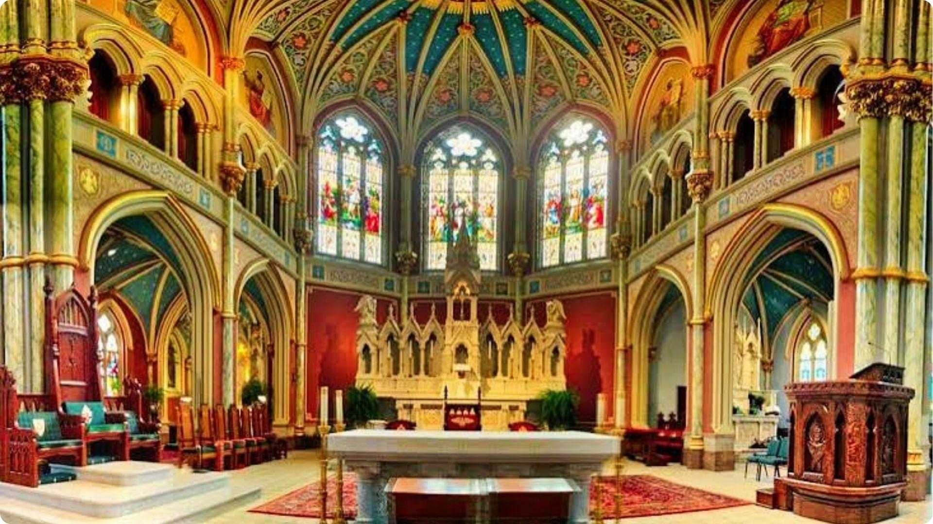 Ornate interior of Cathedral Basilica of St John the Baptist with stained glass in Savannah Georgia