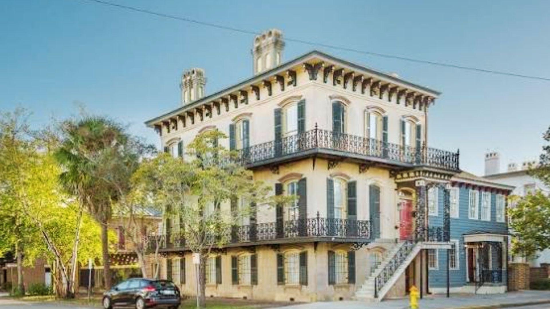 Historic Savannah townhouse with wrought iron balconies and ornate details