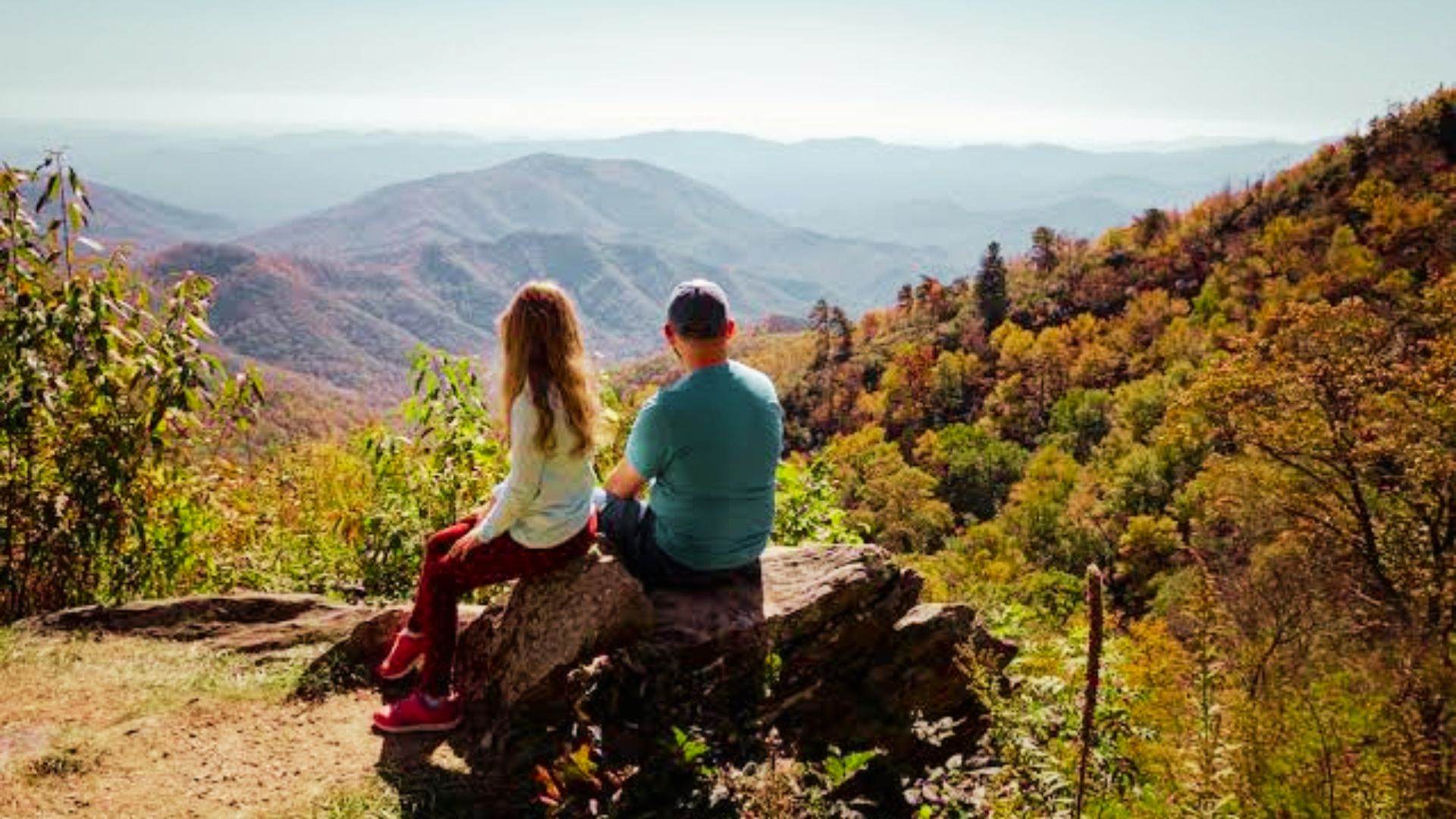 Couple enjoying romantic mountain overlook in Georgia during fall