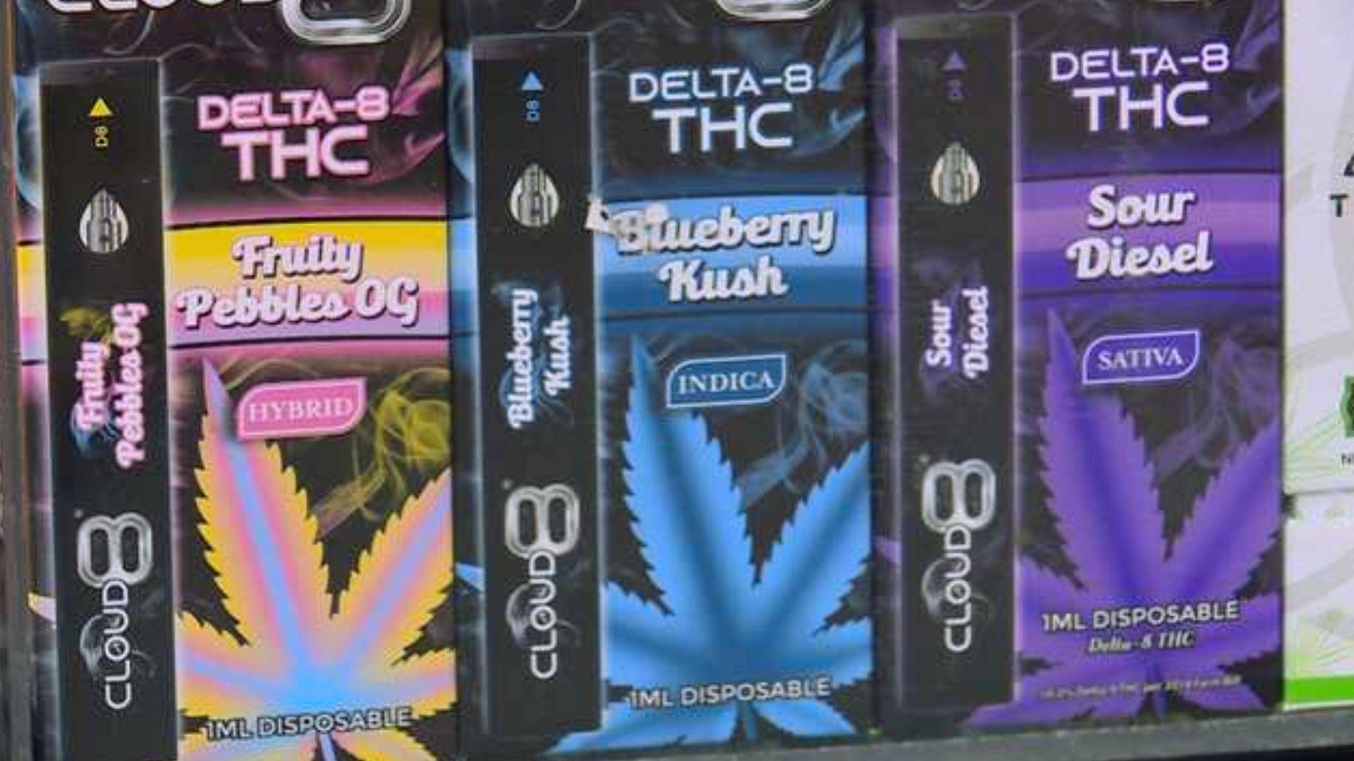 Four Cloud 8 Delta-8 THC disposable vape boxes lined up showing Fruity Pebbles OG and Blueberry Kush flavors