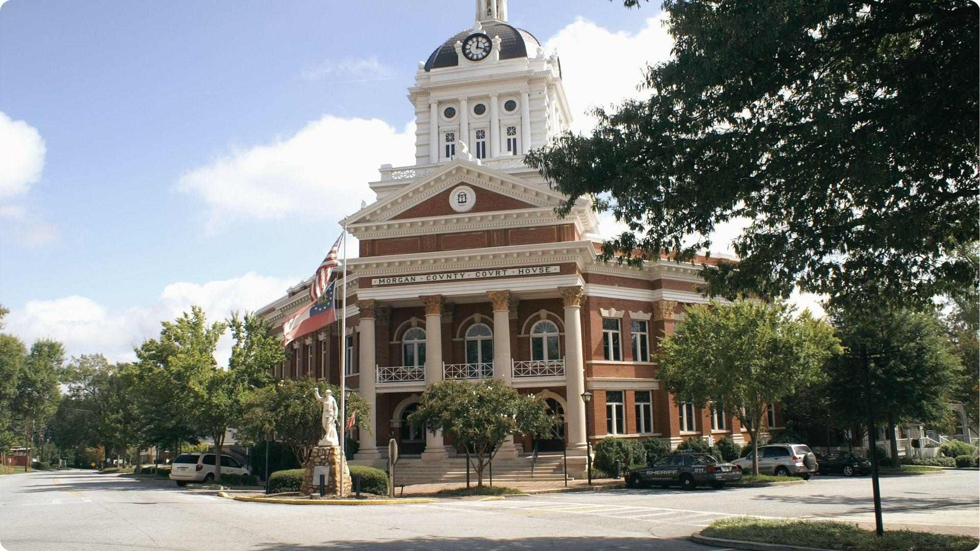 Historic Morgan County Courthouse in Madison with clock tower, charming small-town day trip from Atlanta.