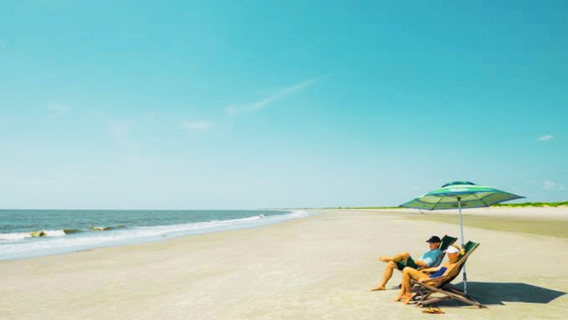 a couple relaxing at the Little St. Simons Island.
