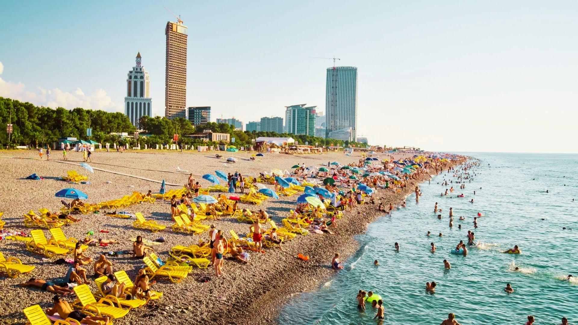 people enjoying summers at the coast.